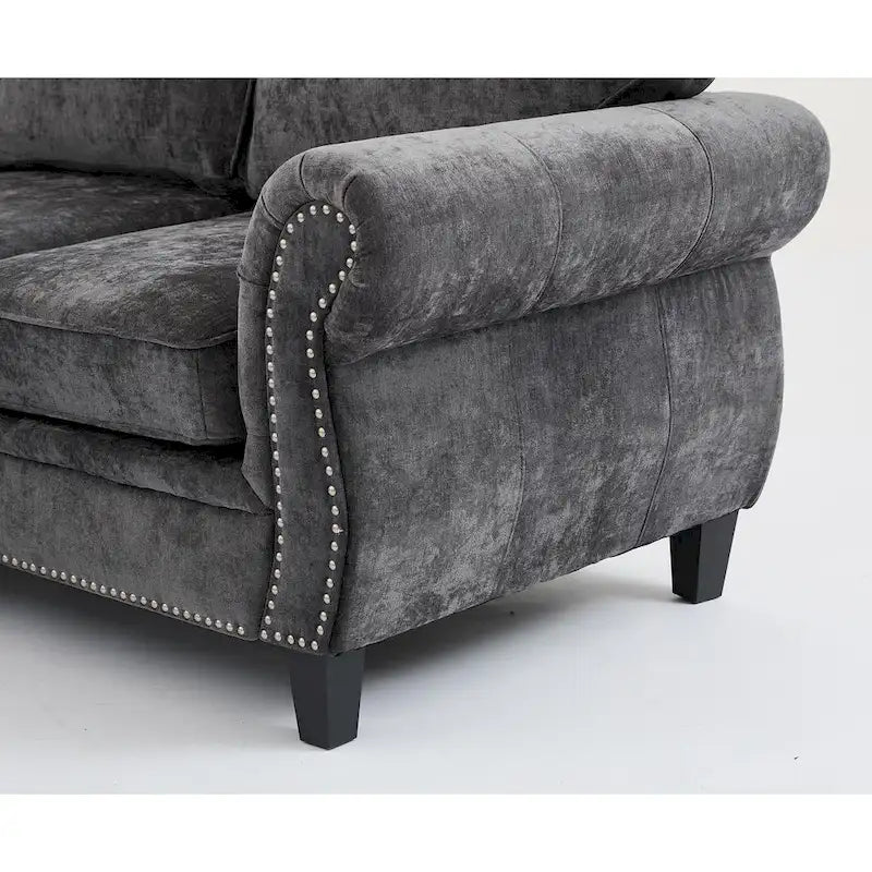 Canapé d'angle 6 places en chenille avec accoudoirs roulés décorés de rivets