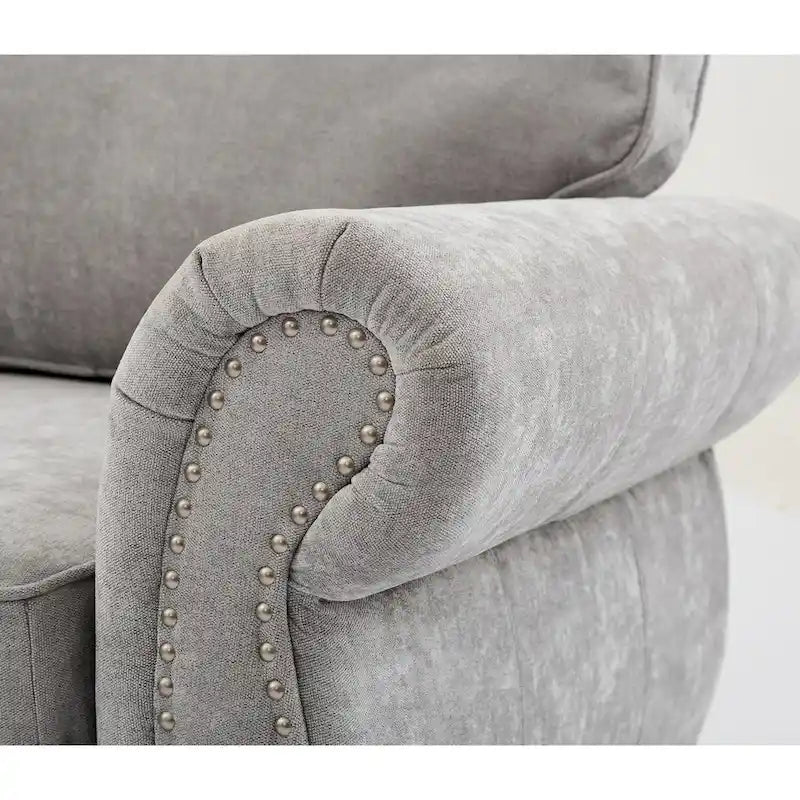 Canapé d'angle 6 places en chenille avec accoudoirs roulés décorés de rivets